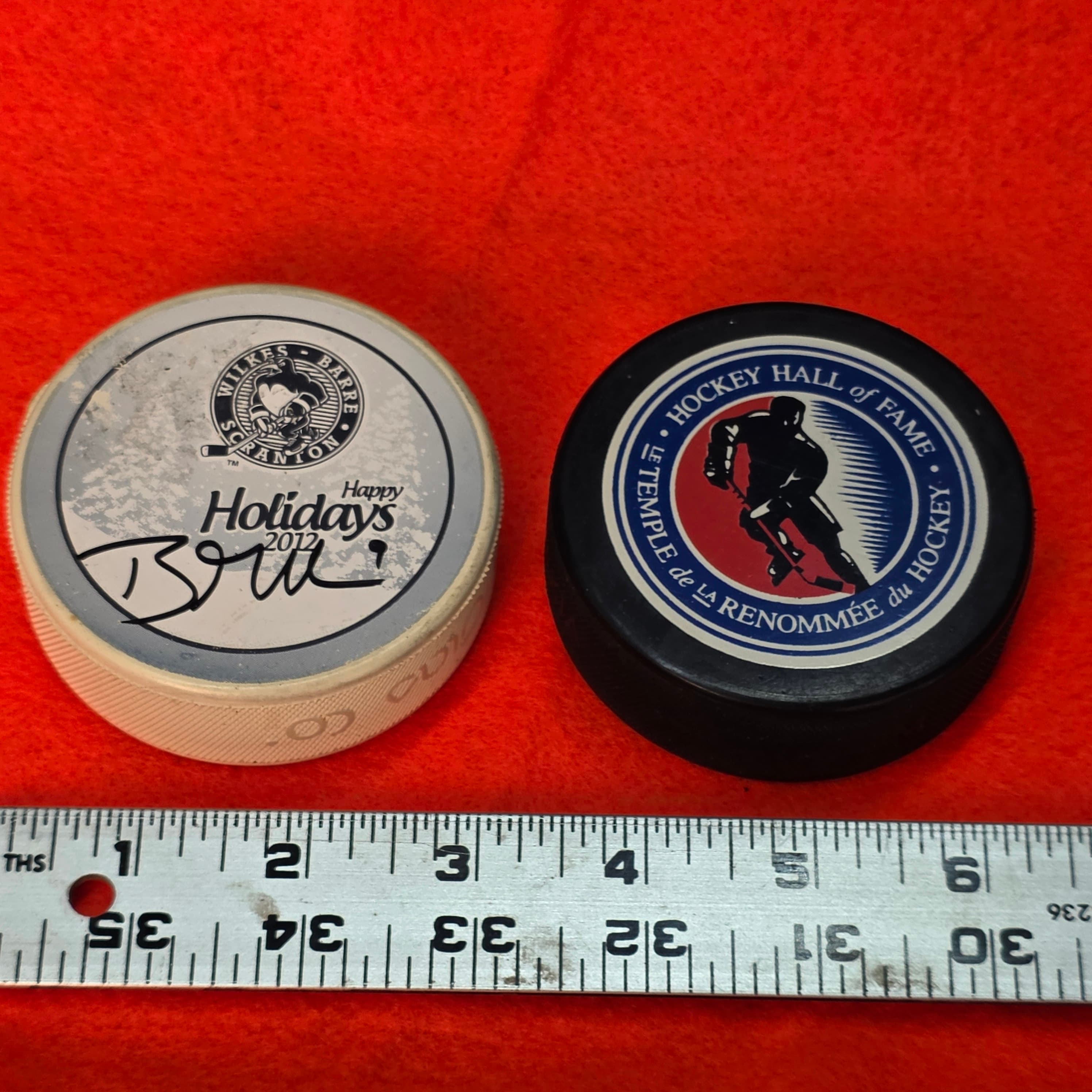 Hockey Puck Lot โ Signed WBS Penguins 2012 & Hockey Hall of Fame