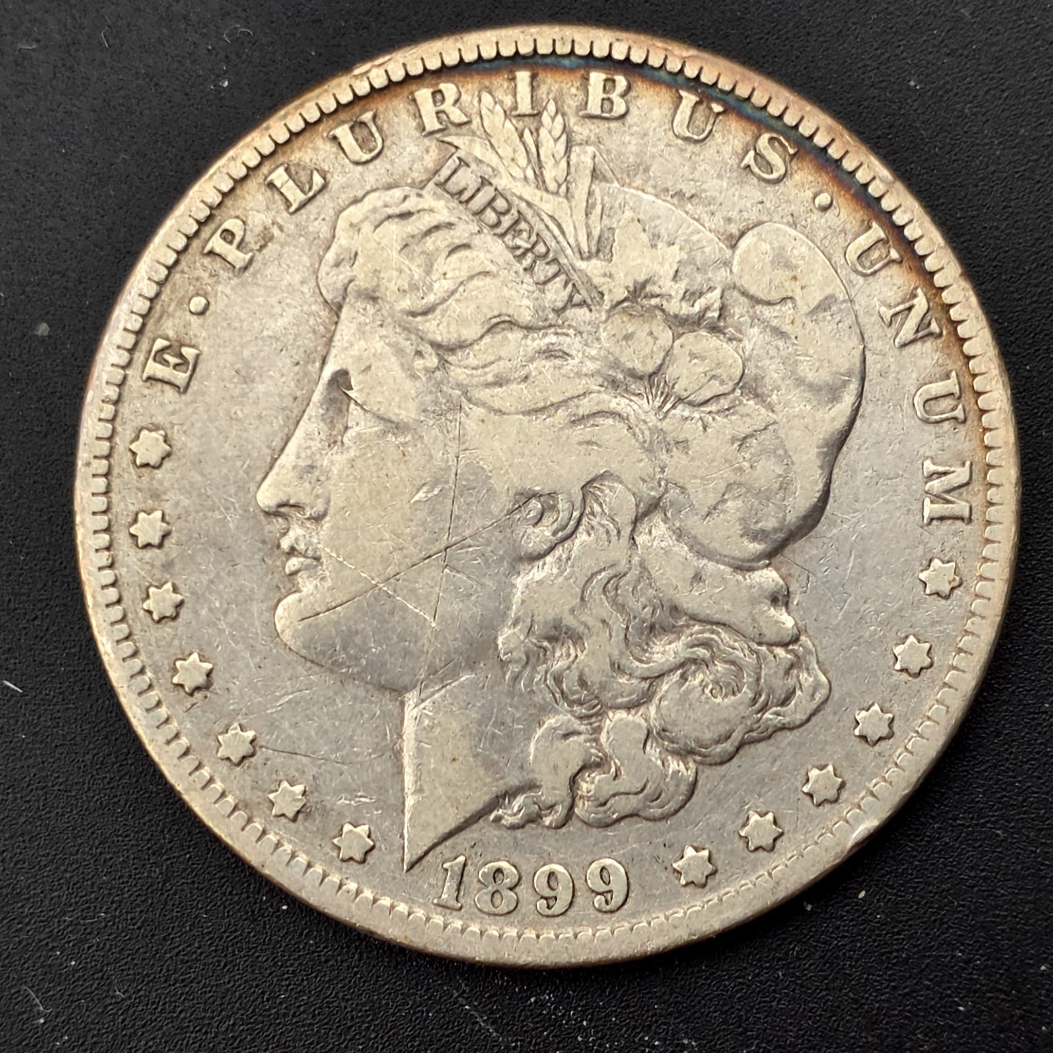1899-O Morgan Silver Dollar, 90% Silver