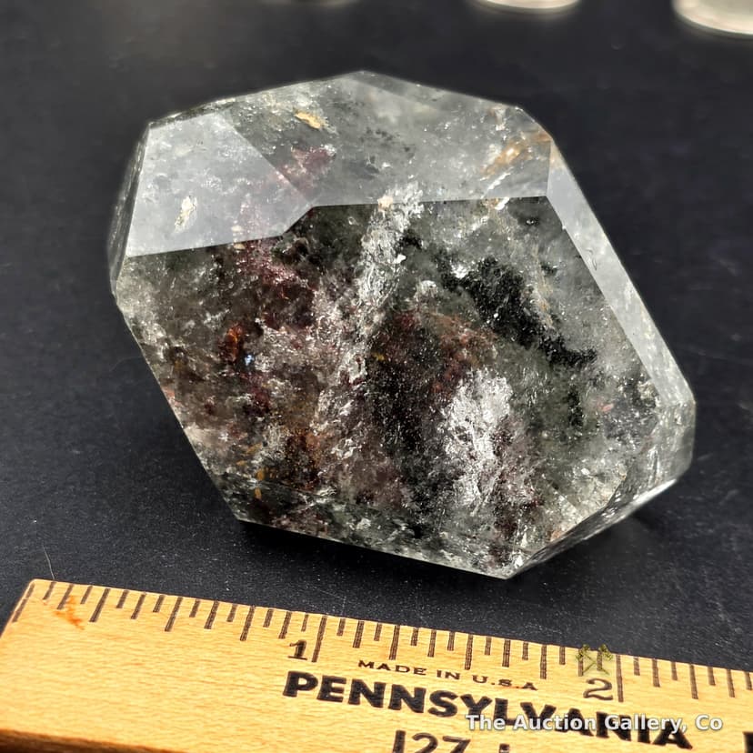 Faceted Quartz Crystal Specimen with Mineral Inclusions