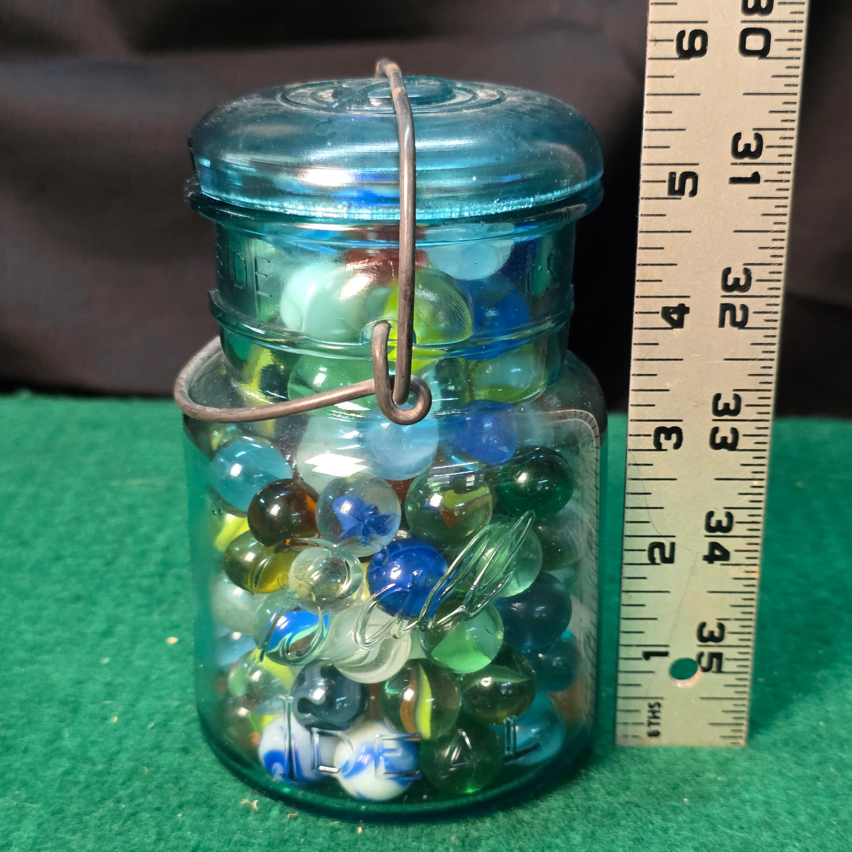 Vintage Blue Glass Wire Bail Jar Full of Marbles