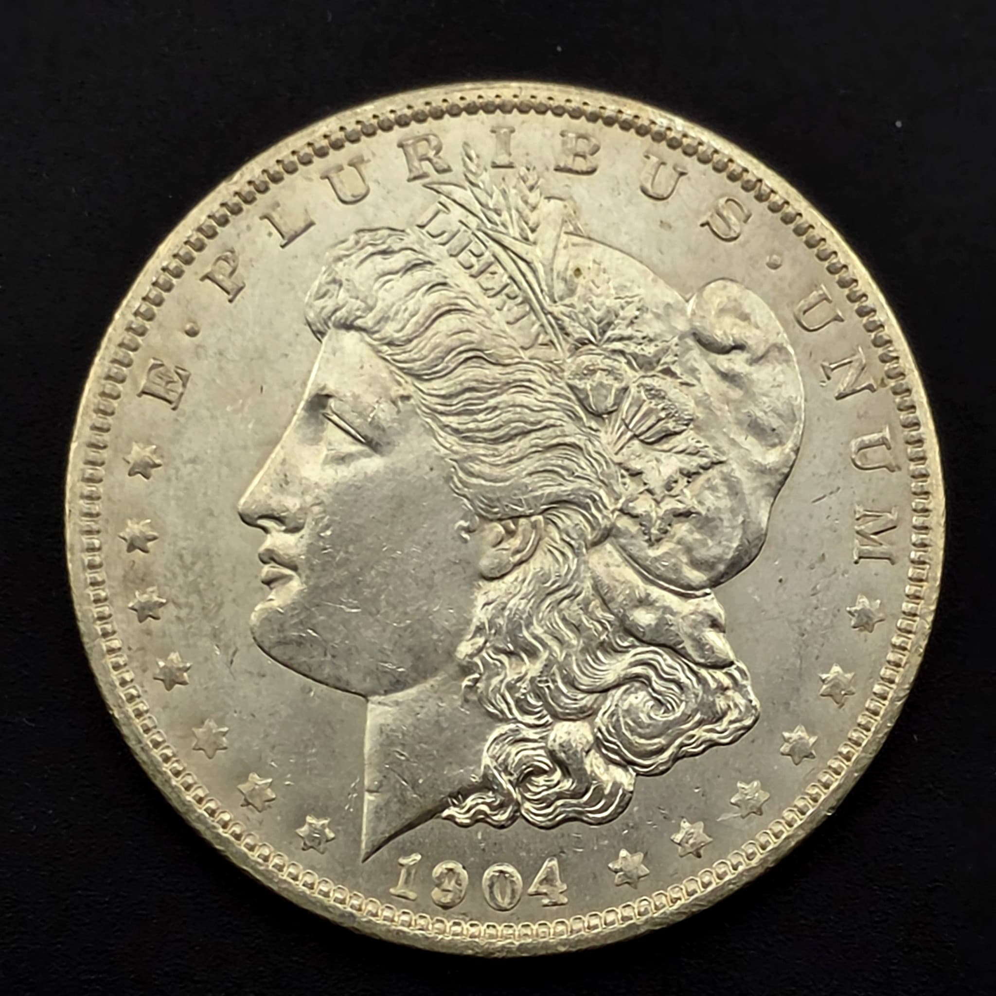 1904-O Morgan Silver Dollar, 90% Silver