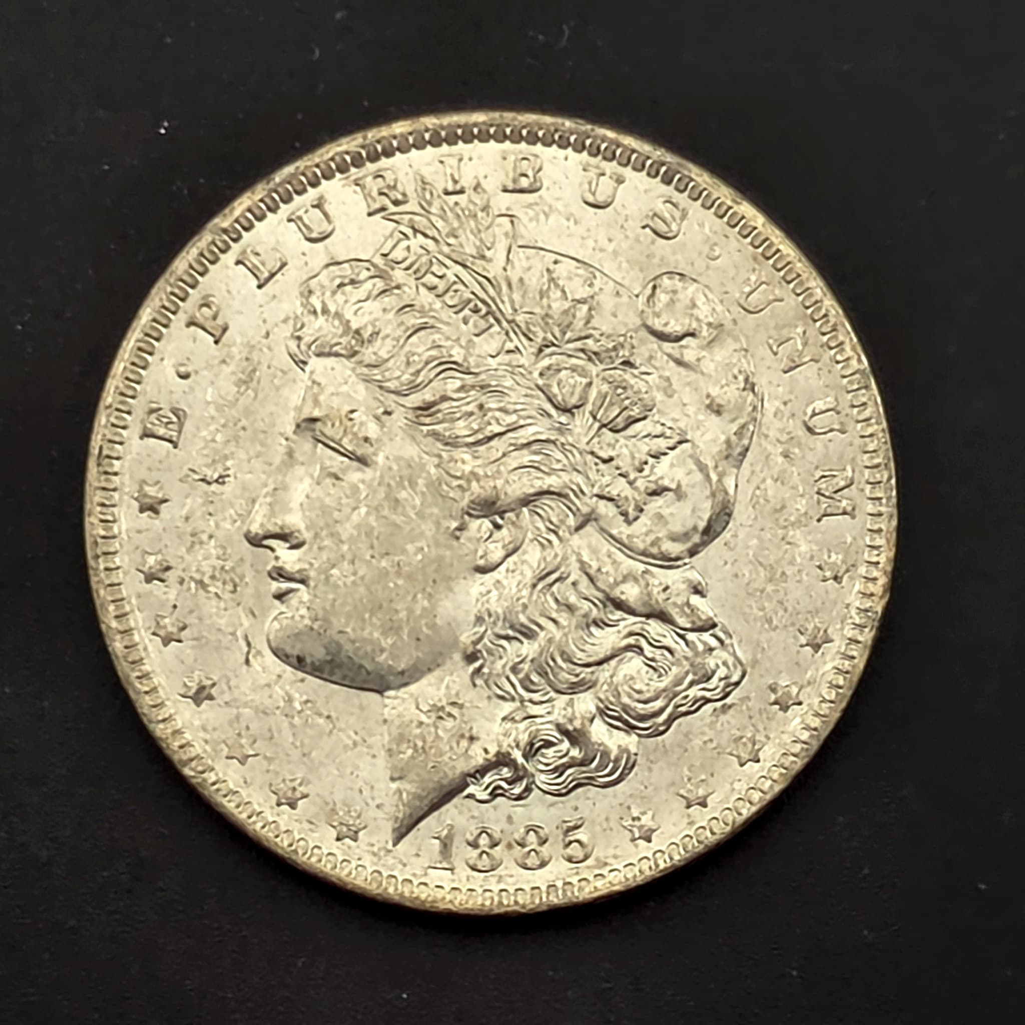 1885-O Morgan Silver Dollar, 90% Silver