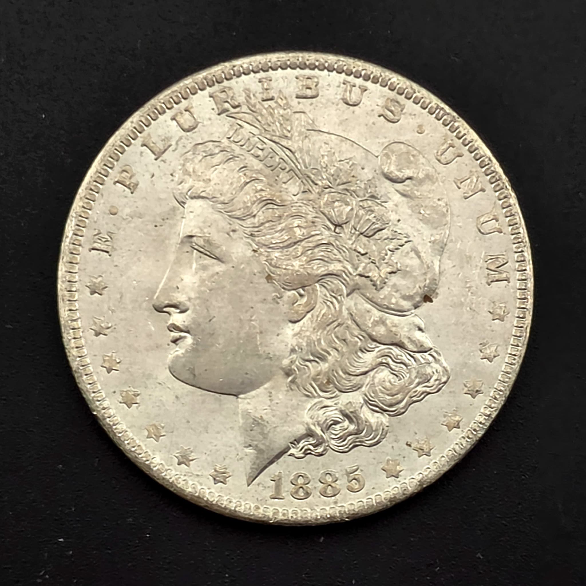 1885-O Morgan Silver Dollar, 90% Silver