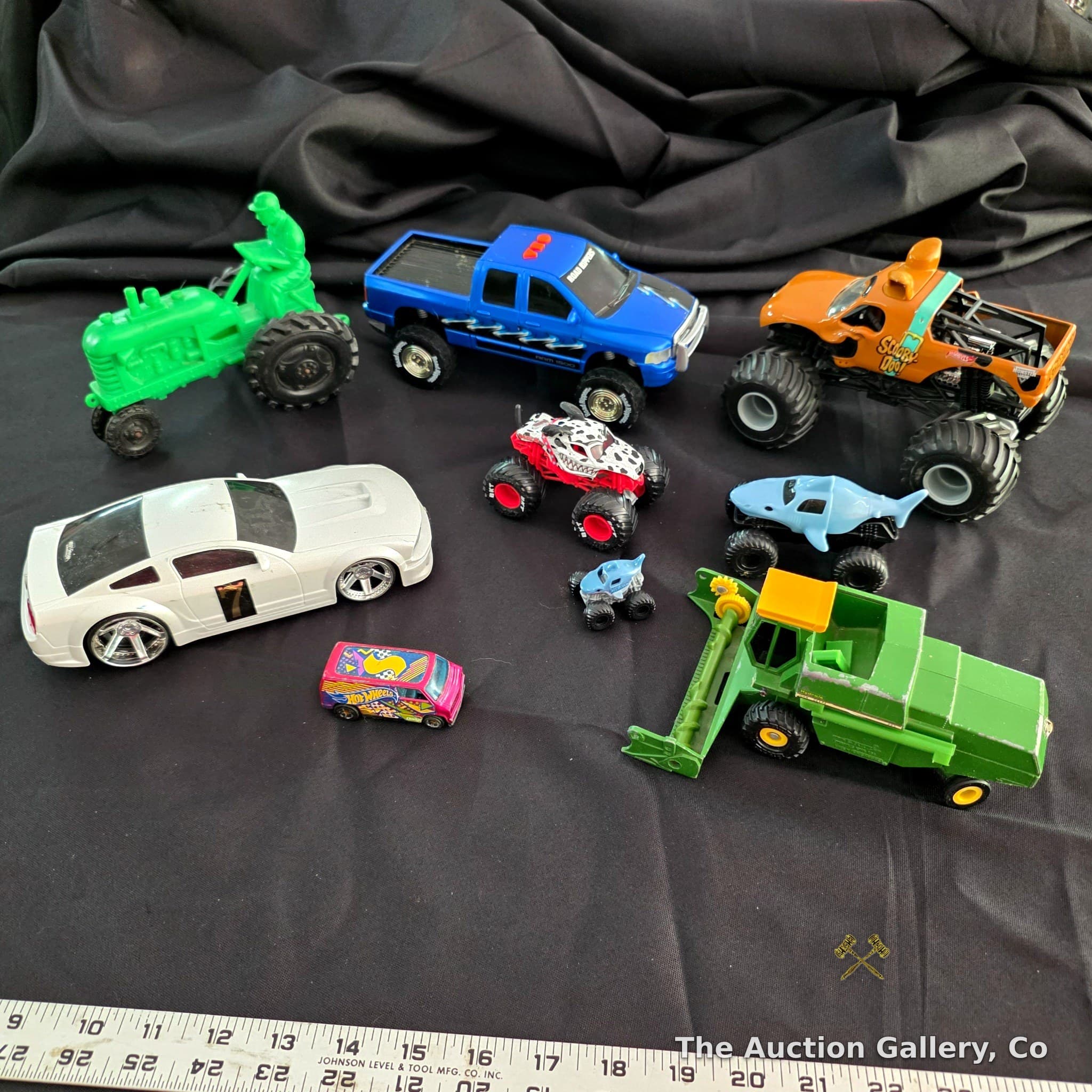 Mixed Lot of 9 Toy Vehicles โ Monster Trucks, Hot Wheels, John Deere