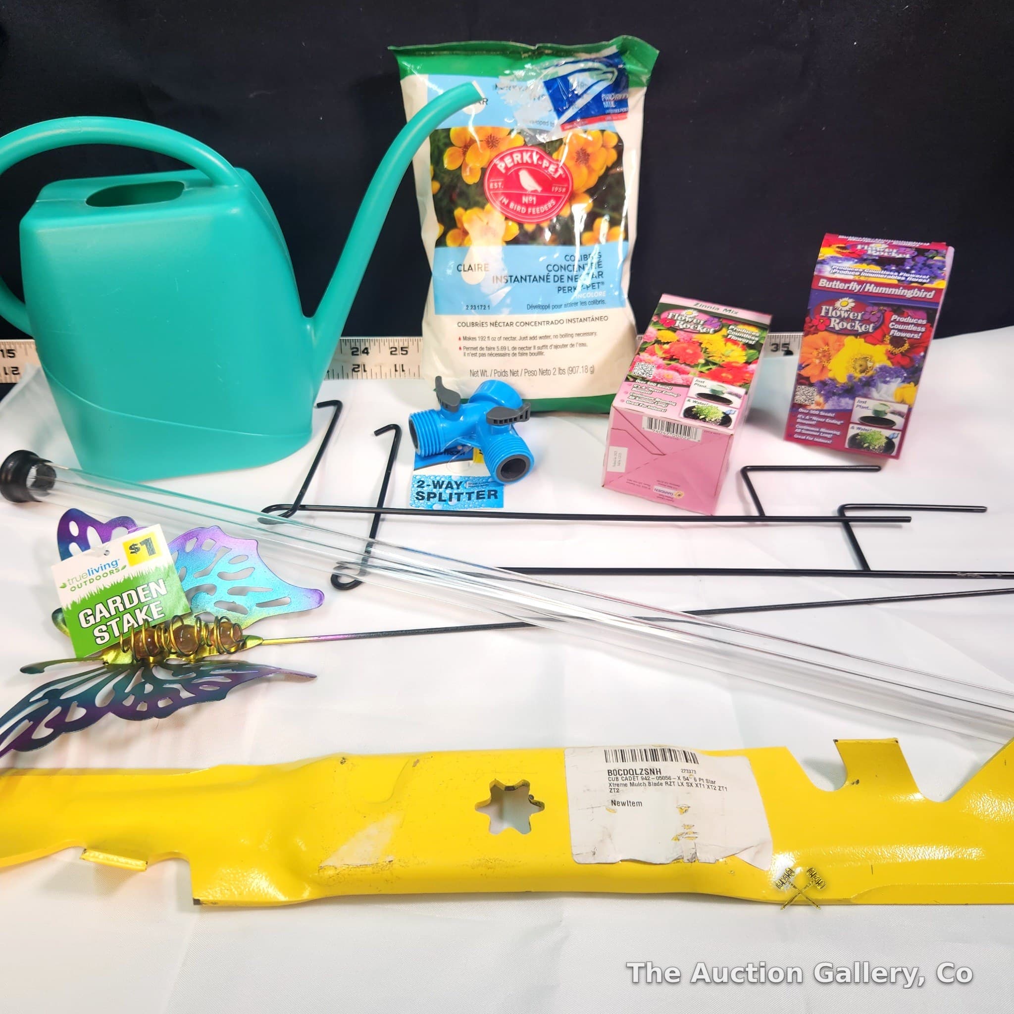 Garden Lot โ Watering Can, Cub Cadet Blade, Nectar, Seeds & More