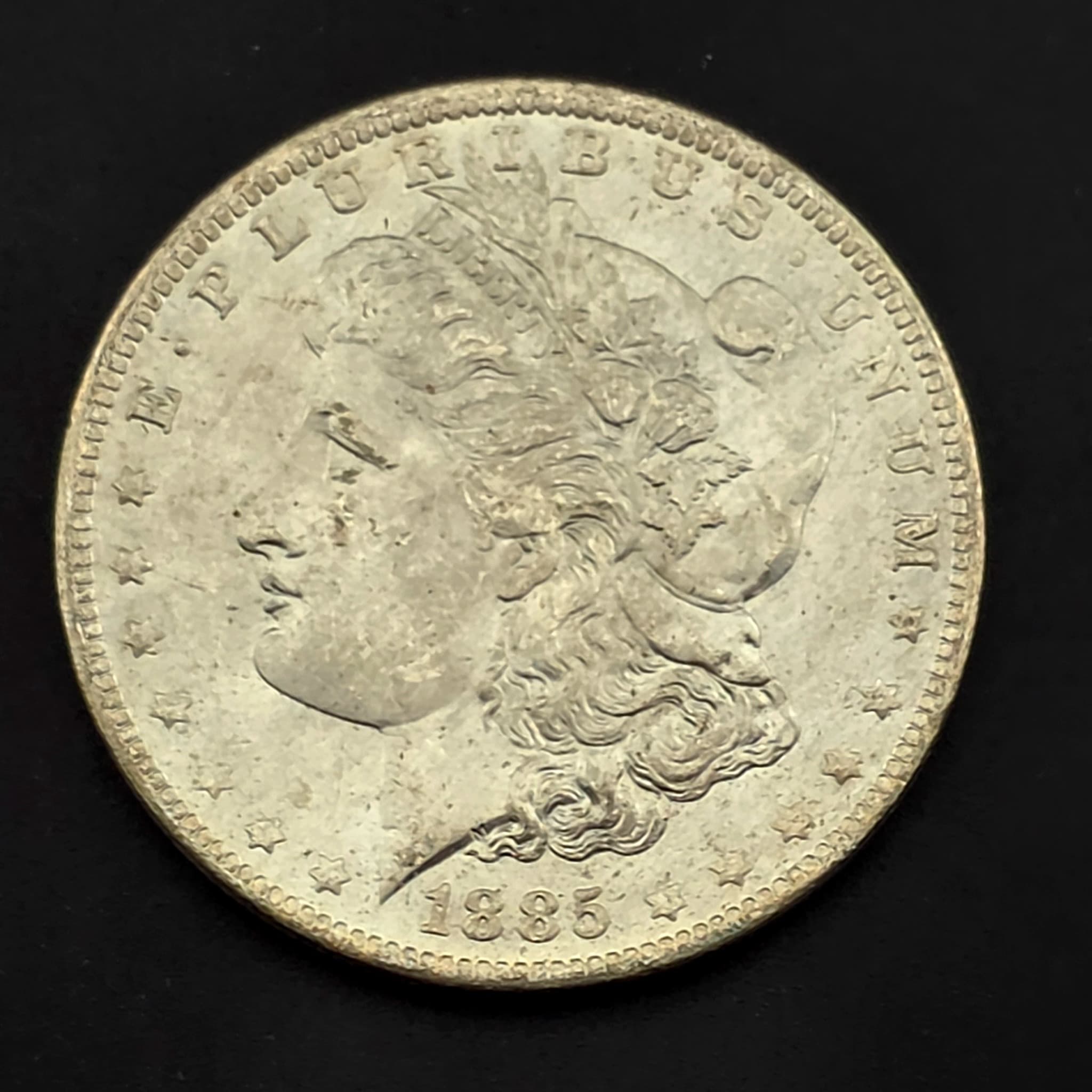 1885-O Morgan Silver Dollar, 90% Silver