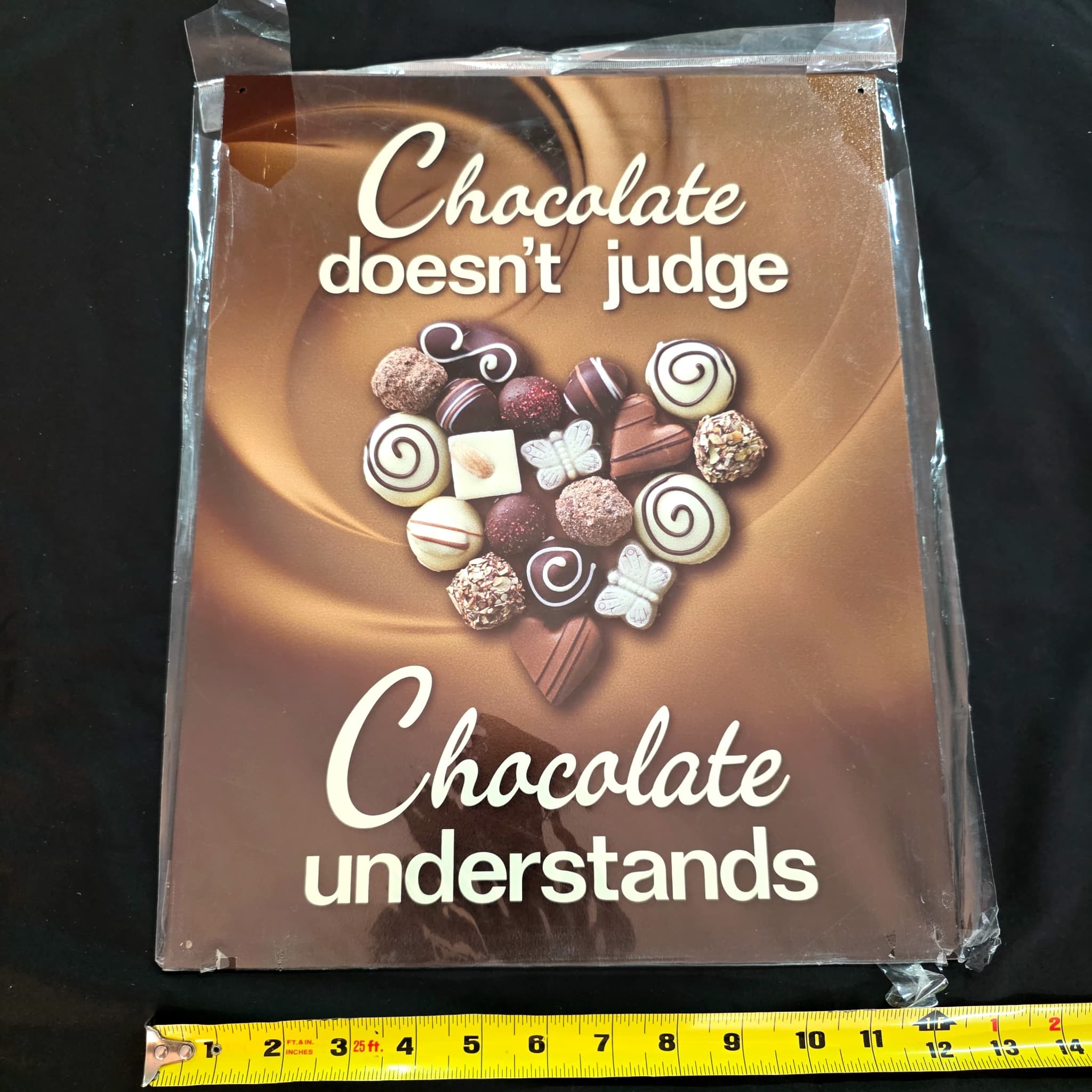 "Chocolate Doesn't Judge" Novelty Metal Sign, 12.5" x 16"