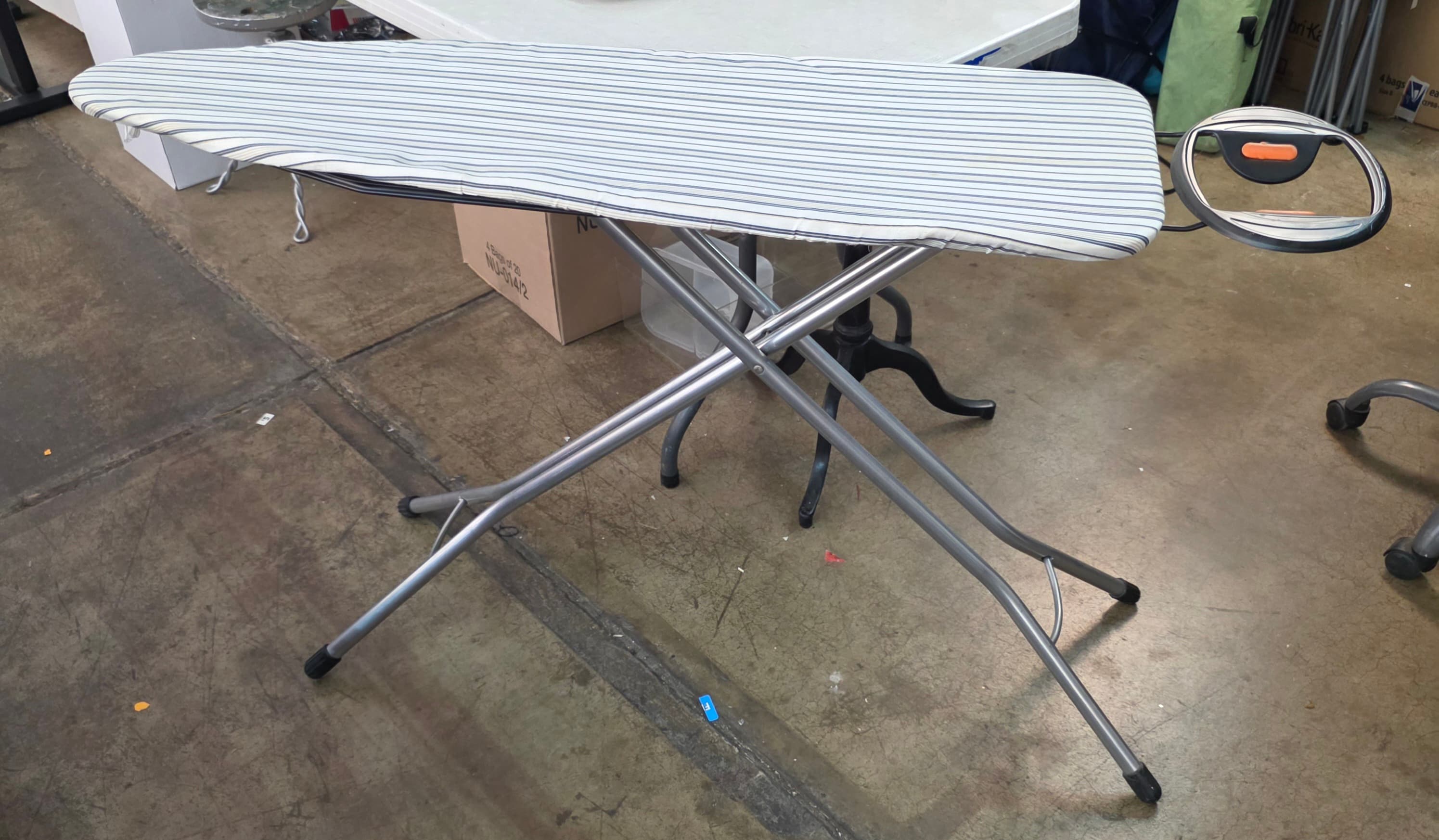 Full-Size Ironing Board with Striped Cover and Iron Rest