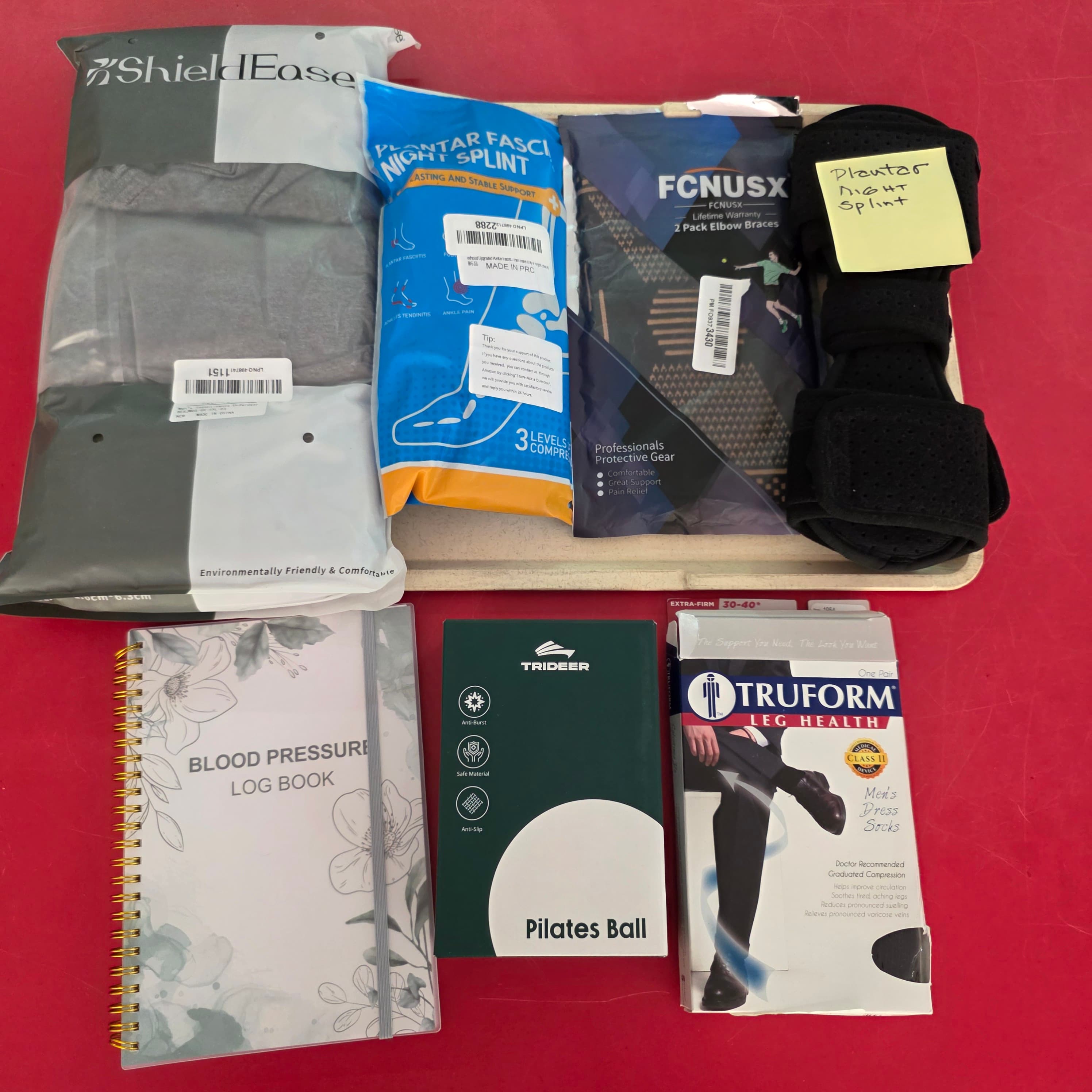 Health & Wellness Lot โ Braces, Compression Socks, Pilates Ball & More