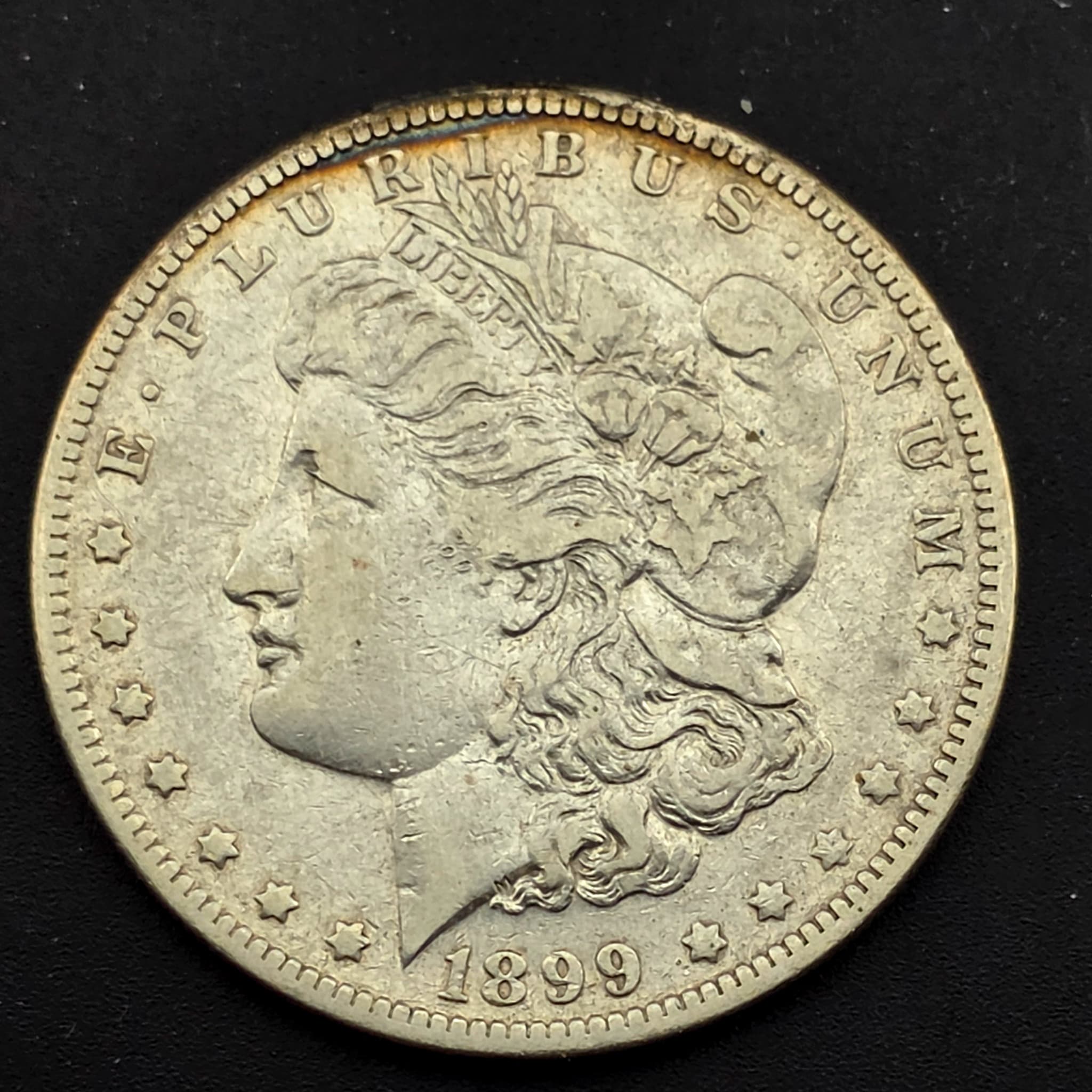1899-O Morgan Silver Dollar, 90% Silver