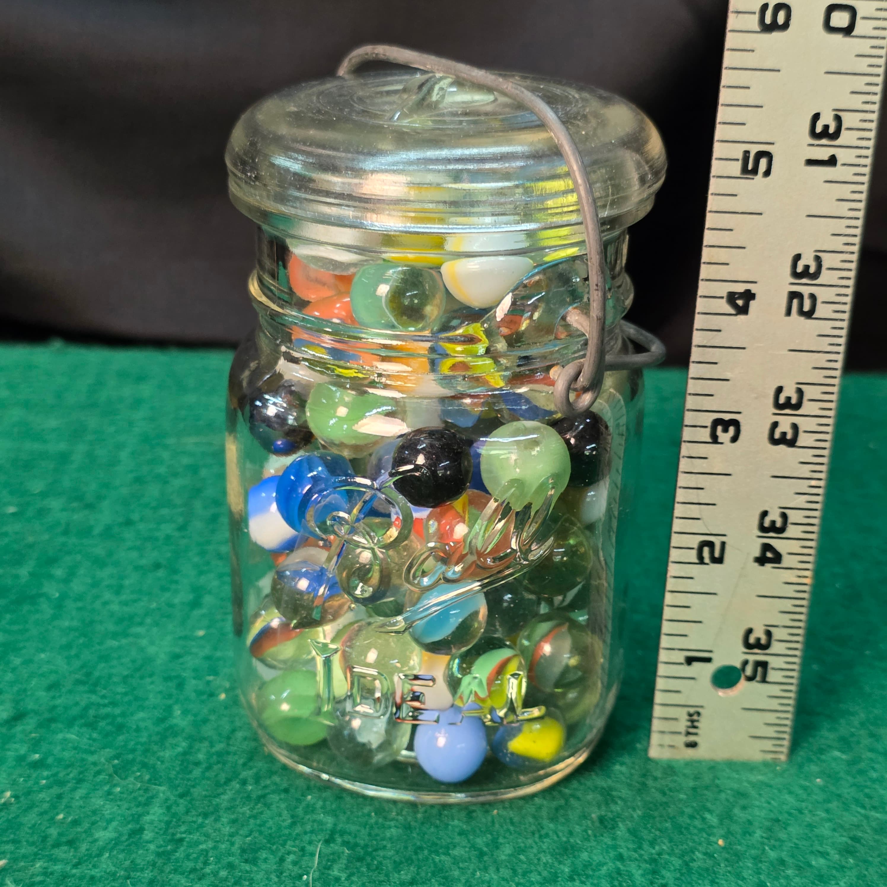 Vintage Glass Marbles in Bail-Top Jar, UV-Reactive Examples