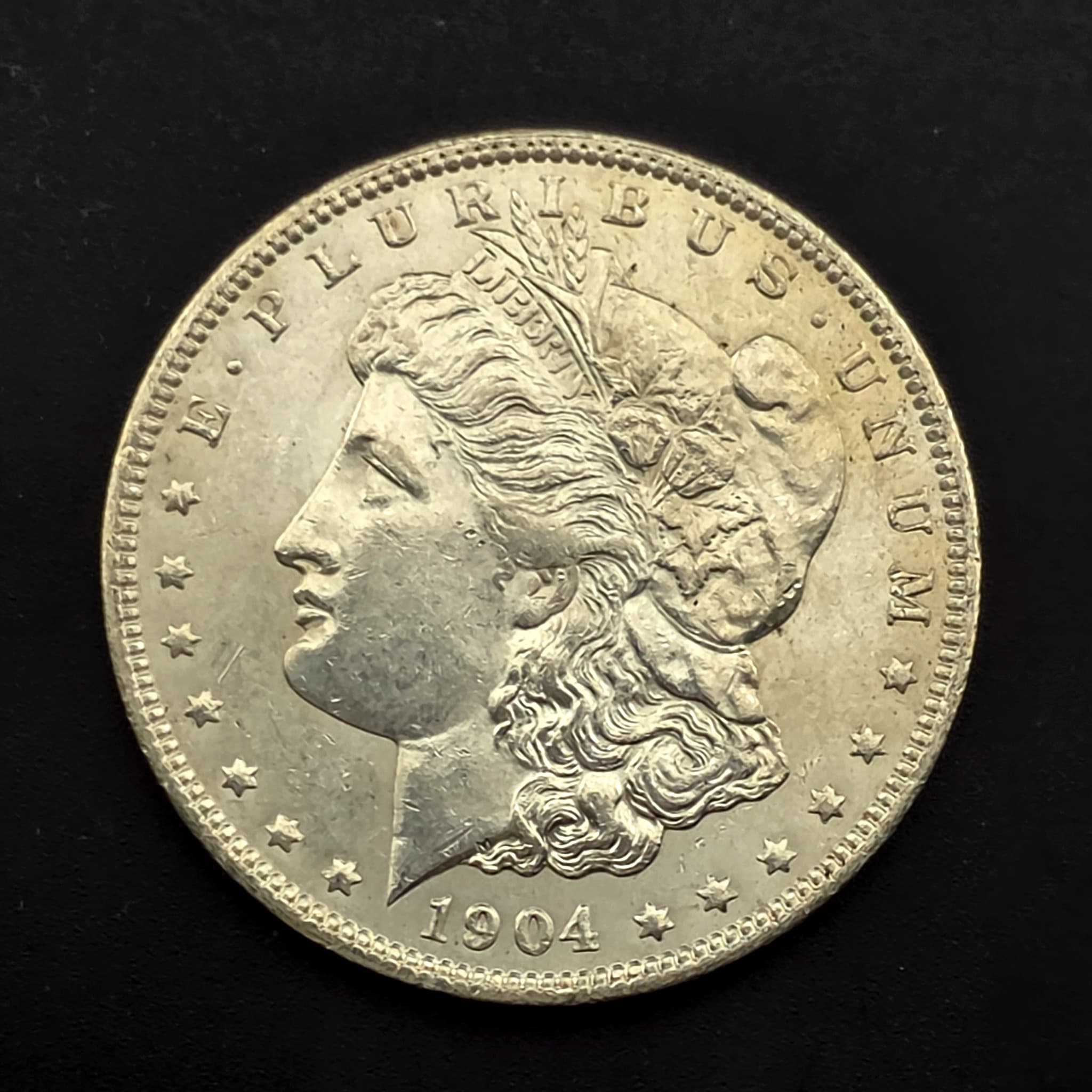 1904-O Morgan Silver Dollar, 90% Silver