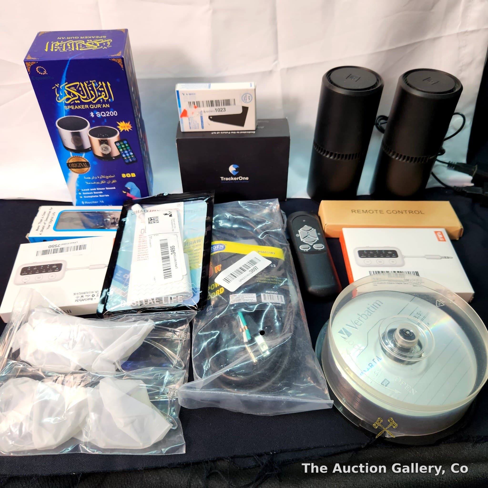 Mixed Electronics Lot โ Speakers, Tracker, Adapter, Discs & More
