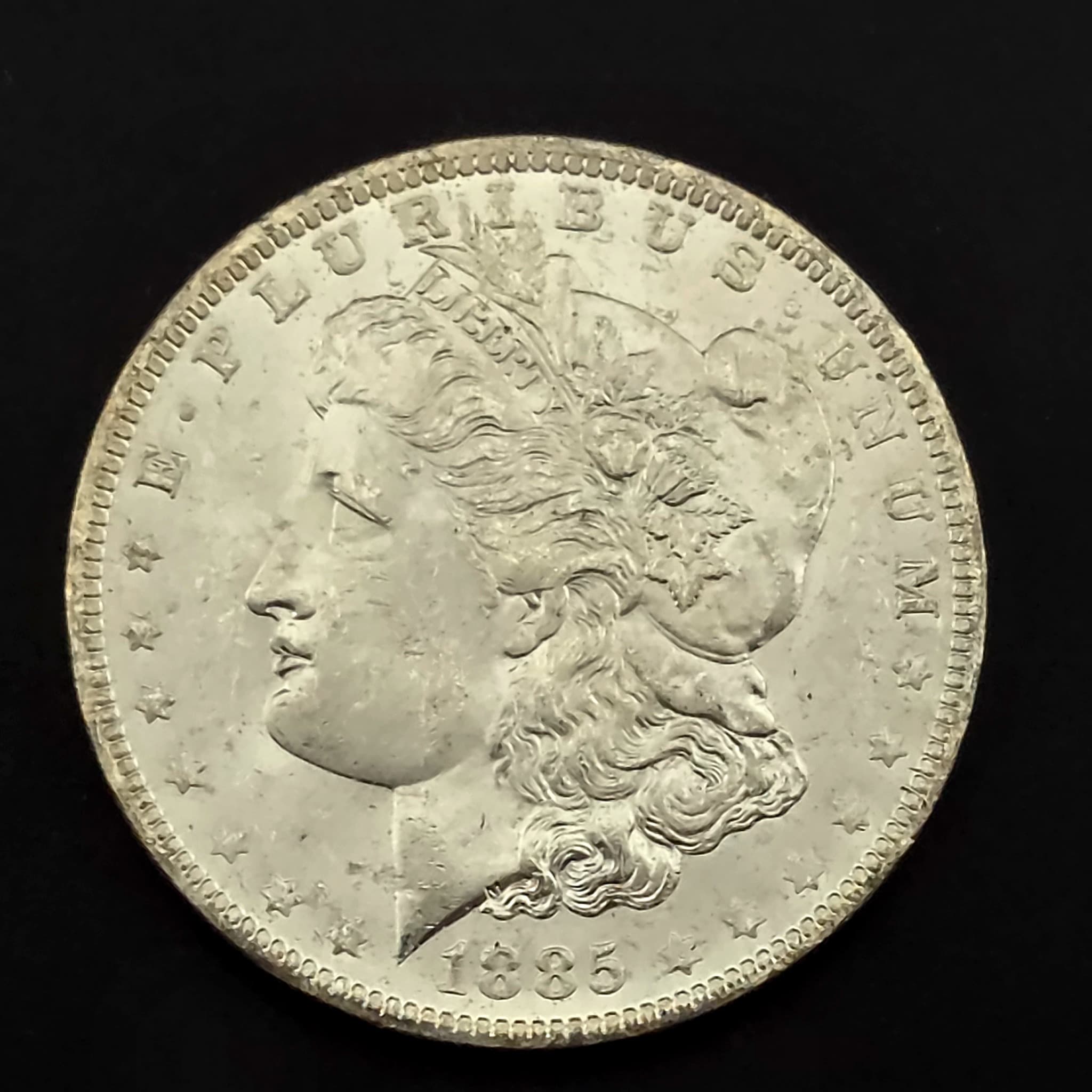 1885-O Morgan Silver Dollar, 90% Silver