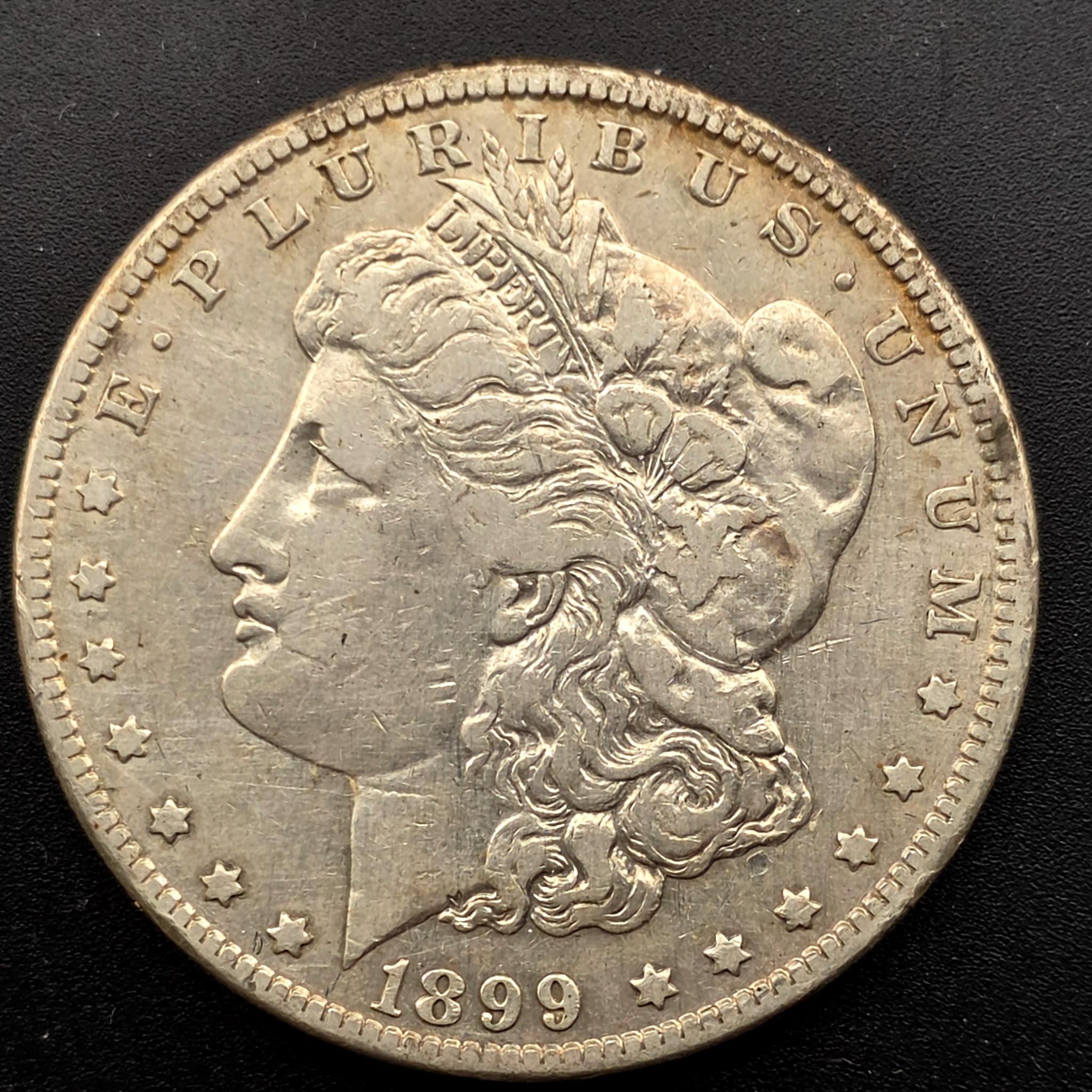 1899-O Morgan Silver Dollar, 90% Silver